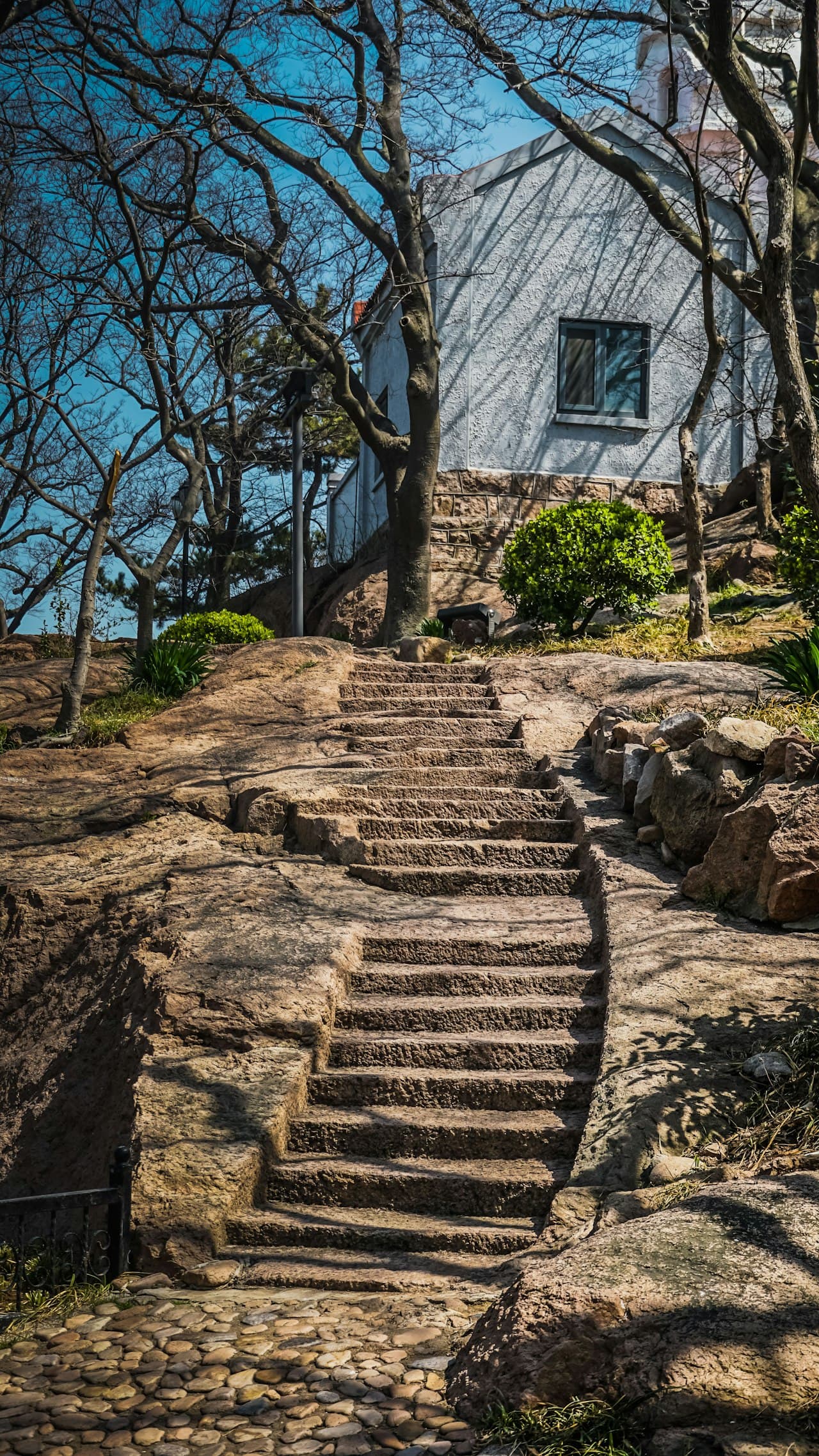 Stone step repair and rebuild — masonry stoop on a New York home